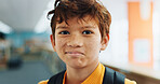 Education, portrait and student with boy in school for child development, growth or learning. Future, scholarship and study with kid learner at academy for classroom lesson. course or knowledge