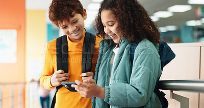 Buy stock photo Happy, children and friends with phone at school watching comedy, funny or comic video online. Smile, cellphone and kid students playing educational game on mobile app together on break at academy.