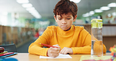 Buy stock photo Boy, learning and paper with thinking at library for test, study and development with problem solving. Kid, notes and solution with education, assessment or school project with scholarship in hall
