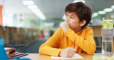 Buy stock photo Boy, education and paper with thinking at library for test, study and development with problem solving. Kid, notes and solution with learning, assessment or school project with scholarship in hall