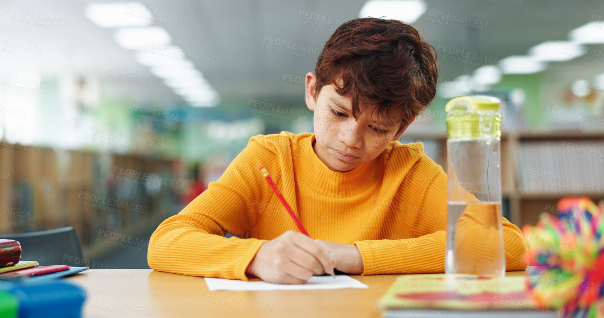 Buy stock photo Boy, education and paper with writing at library for test, study and development with problem solving. Child, notes and solution with learning, assessment or school project with scholarship in hall