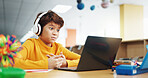 Student, shocked and headphones with laptop for video call, e learning or online class knowledge. Virtual school, development and child on technology for surprise on language teaching platform