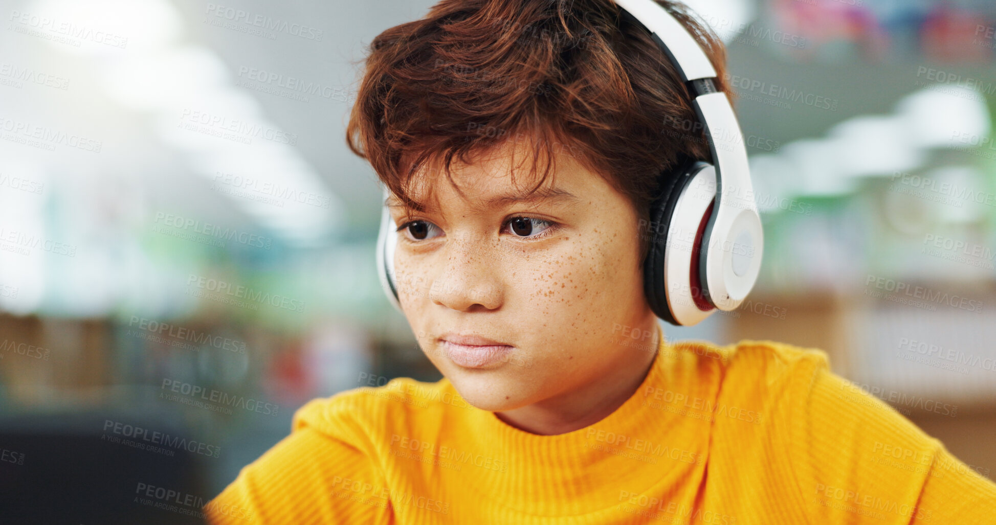 Buy stock photo Boy, child and headphones with computer at library for e learning, study and development with streaming. Kid, pc and sound with subscription for video, education and school project with scholarship