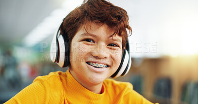Buy stock photo Portrait, smile and child with headphones, music and listening to audio with tech and subscription. Confident, boy and kid with playlist on app, streaming and happy for sound of favorite song in USA