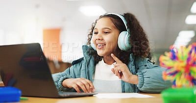 Buy stock photo Student, child and headphones with laptop for video call, e learning or online class for knowledge. Virtual school, development and girl on technology for growth on teaching platform in library