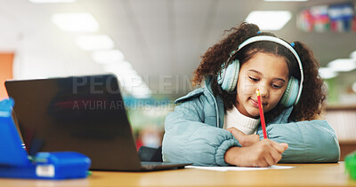 Buy stock photo Student, child and writing with laptop for e learning, video call or online class for knowledge. Virtual school, headphones and girl on technology for assignment on teaching platform in library