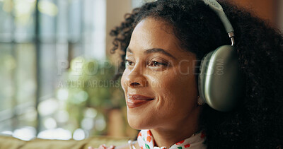 Buy stock photo Thinking, music and happy woman with headphones in home, streaming podcast and subscription. Living room, audio technology and African person listening to radio, reflection and idea for playlist