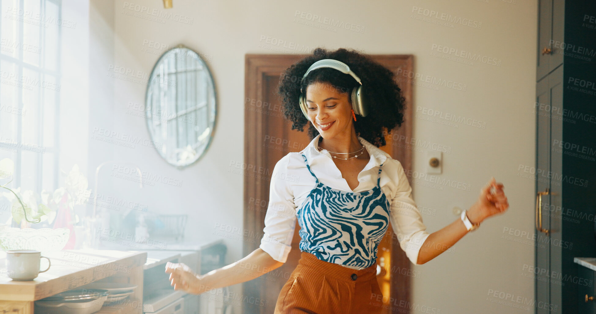 Buy stock photo Energy, woman and dancing with headphones in home for weekend break, music playlist or feel good subscription. Dancer, african person and happy with album track, listening to radio and media podcast