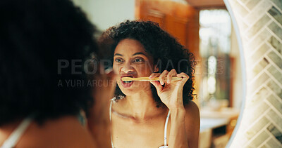 Buy stock photo Mirror, oral hygiene and woman with brushing teeth in bathroom for morning routine, self care and getting ready. Dental health, reflection and cleaning mouth with toothbrush for fresh breath in home