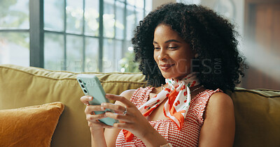 Buy stock photo Happy, relax and African woman on sofa in home for social media, networking and communication. Apartment, living room and person on smartphone for online chatting, internet post or website on weekend