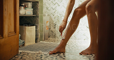 Buy stock photo Razor, hair removal and woman shaving legs in bathroom for skincare, cleaning or grooming in home. Foam, beauty and female person with cosmetic epilation routine in morning for hygiene in apartment.