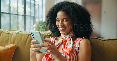 Buy stock photo Laugh, social media and African woman on sofa in home for online joke, networking and connection. Apartment, living room and person on smartphone for funny chat, internet post or website on weekend
