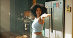Fitness, stretching and yoga with woman in kitchen for start of holistic, pilates or wellness routine. Arms, balance and exercise with person in home for awareness, preparation or warm up as yogi