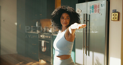 Buy stock photo Fitness, stretching or yoga with woman in kitchen for start of holistic, pilates or wellness routine. Warrior pose, balance or exercise with girl in home for self care, preparation or warm up as yogi