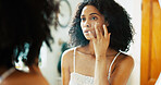 Mirror, skincare and cream with woman in bathroom for glow facial, cosmetics lotion and cleaning. Dermatology, self care product and beauty treatment with person at home for reflection and grooming