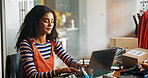Fashion, online store and woman with typing on laptop for stock procurement, supply chain and client email. Ecommerce, startup owner and tech for shipping info, delivery tracking and small business