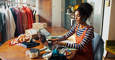 Buy stock photo Fashion designer, woman and typing on laptop at small business for fabric order, stock procurement or planning. Entrepreneur, person and tech for shipping schedule, inventory management and delivery