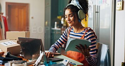 Buy stock photo Fashion designer, happy and woman on laptop and tablet for small business, ecommerce and supply chain. Creative, startup and person with music on headphones for tailor, textile and clothing retailer