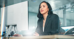 Agency, night and woman on computer in finance office for online news report, taxes or audit. Reading, review and banker typing on desktop in financial agency for equity, stock or investment growth