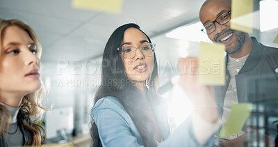 Buy stock photo Woman, writing and sticky note with teamwork, glass board for project ideas and agenda schedule. Collaboration, problem solving and group in business discussion for brainstorming meeting in office