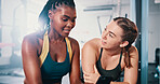 Fitness, talking and girl friends in gym for morning workout with wellness, health and training. Happy, conversation and women athletes with exercise plan together for weight loss in sports center.