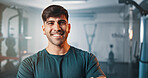 Portrait, exercise and happy man in club for fitness, muscle and strength for health. Smile, wellness and confident person at gym to workout for sports, bodybuilding and athlete training in Spain