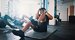 Fitness, exercise and sit ups with personal trainer, class and gym for training or workout routine. Coaching, goals and target with group of sports people in health club together for core muscle