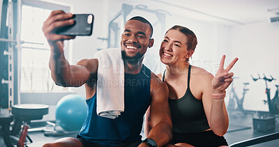 Buy stock photo Smile, man and woman in gym selfie with peace sign, friends and team workout together. Photography, athlete and happy personal trainer at sports club for exercise, fitness influencer and social media