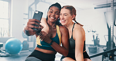 Buy stock photo Fitness, friends and women in gym selfie with partnership, bonding and team workout together. Photography, athlete and personal trainer at sports club for exercise, happy influencer and social media