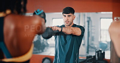 Buy stock photo Gym, fitness and kettlebell with personal trainer, class and workout for training or exercise routine. Weightlifting, goals and target with group of sports people in health club together for muscle