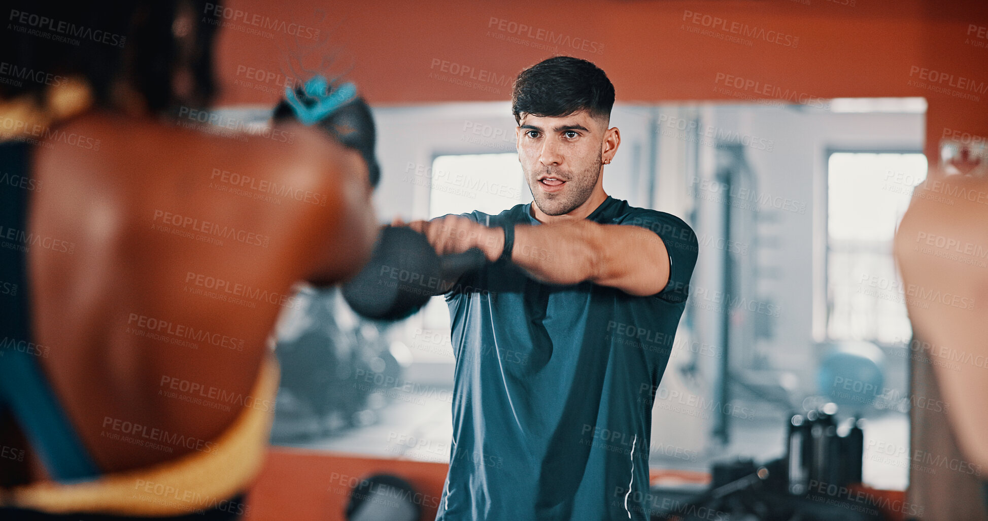Buy stock photo Gym, fitness and kettlebell with personal trainer, class and workout for training or exercise routine. Weightlifting, goals and target with group of sports people in health club together for muscle