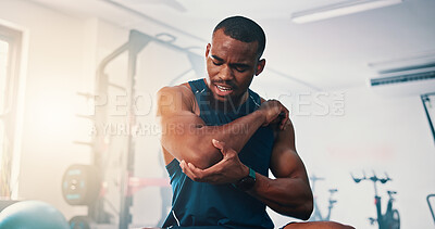 Buy stock photo Gym, joint pain and African man with fitness, injury and athlete with orthopedic issue or fibromyalgia emergency. Person, muscle tension or medical arthritis with training or health club workout