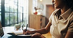Hands, notebook and writing for remote work from home by laptop, planning and freelance job. Person, editor and story development with article for journal, review or newsletter in morning at house