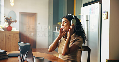 Buy stock photo Woman, student and headphones with music in home for break with laptop, happy or online course in morning. Girl, person and e learning with streaming subscription, education or scholarship in kitchen