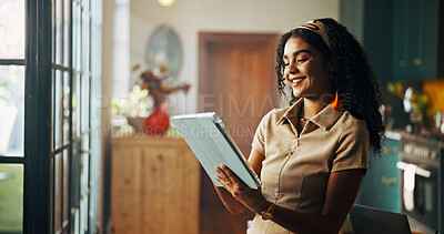 Buy stock photo Remote work, smile and tablet with woman in kitchen of home for small business planning or research. App, freelance and startup with happy entrepreneur in apartment for professional development