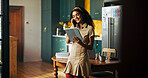 Phone call, remote work and tablet with woman in kitchen of home for small business planning or research. App, communication and smile with freelance entrepreneur in apartment for startup development