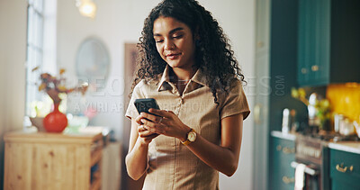 Buy stock photo Home, woman and online with smartphone for chat, check message and communication on social media. House, female person and connection with mobile for application, text or internet browsing in kitchen