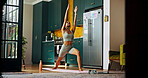 Fitness, stretching and yoga with woman in kitchen of home for balance, health or holistic routine. Chakra, stress relief and wellness with yogi person on floor in apartment for exercise or wellbeing