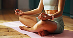 Fingers, yoga and lotus on floor in home, start and pose with mudra for routine, wellness and balance. Person, hands and meditation with chakra, zen and mindfulness for peace in morning at apartment