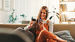 Happy, woman and phone with credit card at house for payment, online shopping and banking information. Person. mobile app and pin for financial transaction, ecommerce purchase and investment website
