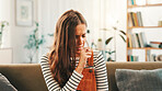 Home, sick and woman on sofa, cough and disease with illness, pneumonia and bronchitis in living room. Apartment, person and girl on couch, cold or allergies with chest pain, sinus or asthma symptoms