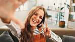 Peace sign, selfie and portrait of woman in home for relax, calm and break on weekend for social media. Happy, tongue out and person with photography for profile picture in living room at house.