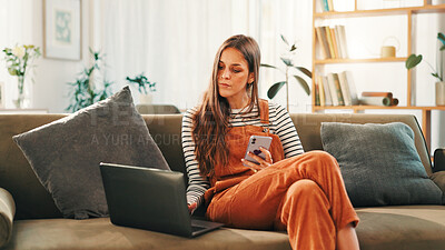 Buy stock photo Woman, laptop and phone with person, sofa and living room of home for ecommerce or online shopping. App, communication and computer with customer in apartment for bargain, retail sale or review