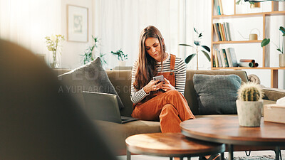Buy stock photo Woman, phone and typing with laptop, sofa and living room of home for ecommerce or online shopping. App, communication and computer with customer in apartment for bargain, retail sale or review