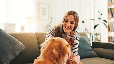 Buy stock photo Playing, bonding or happy woman in home with pet, support or companion in lounge with care or love. Animal adoption, excited or girl on couch with golden retriever, best friend or dog for training