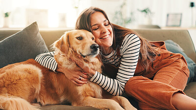 Buy stock photo Hug, relax or happy woman with dog, support or companion in house living room with care or love. Animal adoption, affection or girl in apartment with golden retriever, best friend or pet for bonding