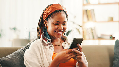 Buy stock photo Smile, online and woman with smartphone in home for social media, reading forum or ebook. African person, mobile and relax on sofa with chat app for communication, text notification or download game