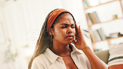 Buy stock photo Anxiety, headache and tension with black woman on sofa in living room, home for break or recovery. Burnout, migraine or stress and person in apartment with symptoms of discomfort, fatigue or pain