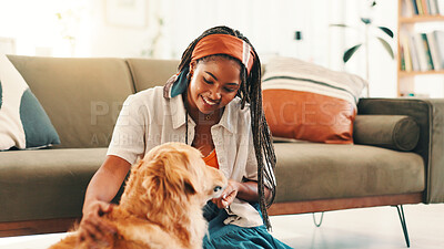 Buy stock photo Home, obedience or African woman with dog, support or companion on sofa for learning or bonding. Animal adoption, training or happy girl with love for teaching golden retriever, best friend or pet