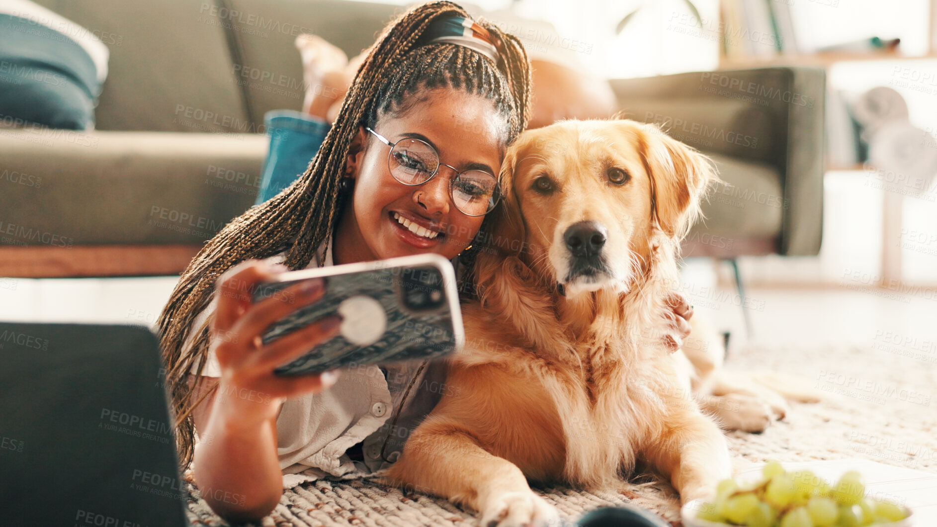 Buy stock photo Relax, black woman and selfie with dog on floor for social media, animal adoption and canine companion. Smile, girl and pet care with golden retriever in living room at home for calm and cozy friends